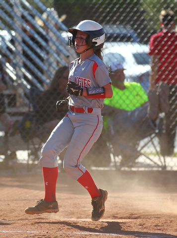 Arbor View’s Bryce Henricksen crosses home plate in the sixth inning of the Aggies&#82 ...