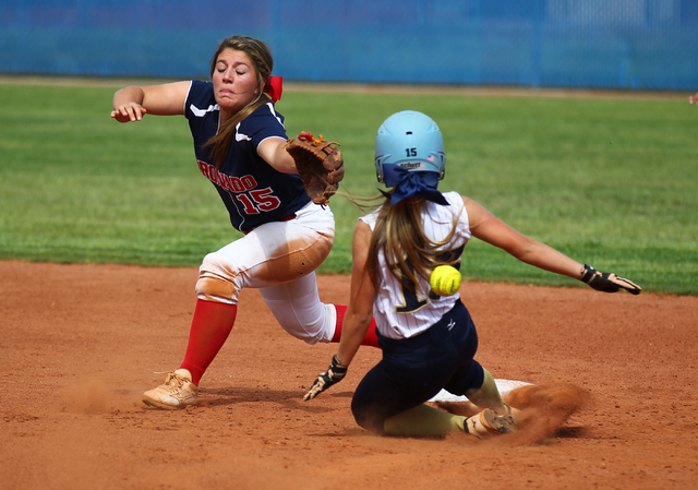 Foothill’s Hannah Stevens (15) slides safely into second as Coronado’s Danielle ...