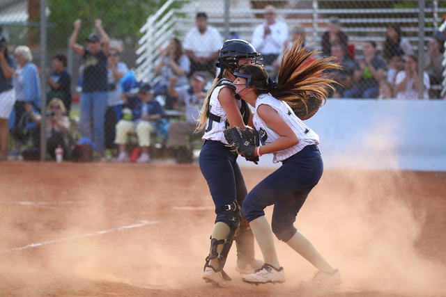 Foothill catcher Hannah Stevens, left, and pitcher Sarah Penska celebrate an 8-7 win over Co ...