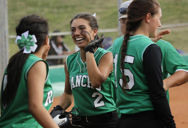 Rancho’s Katerina Anthony (2) gets congratulated by her teammates after driving in the ...