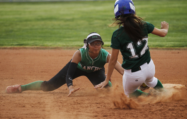 Rancho shortstop Tiare Lee (4) tags out Green Valley’s Jacqueline Smith (12) on a stol ...