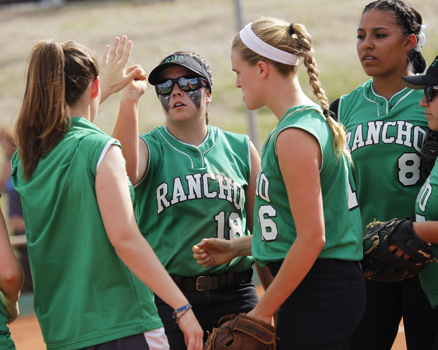 Rancho senior pitcher Brandy Marlett (18) gets congratulated by her team after defeating Gre ...