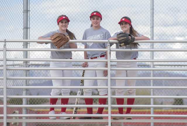 Triplets, from left, Breanne, Brittany and Bryce Henriksen, 16, pose for a portrait at Arbor ...