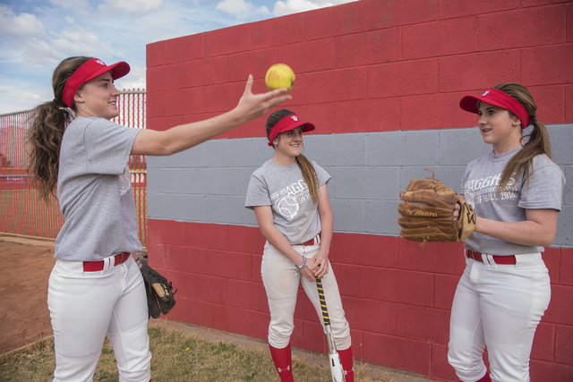 Triplets, from left, Brittany, Bryce and Breanne Henriksen, 16, hang out at Arbor View High ...