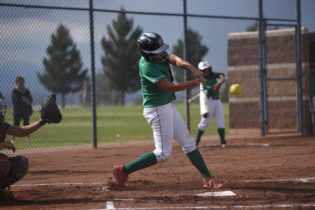 Rancho’s Tiara Lee (22) swings at a pitch against Coronado during their softball game ...