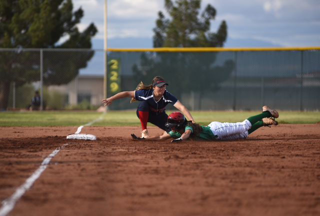 Coronado’s Sophia McCann (16) tags out Rancho’s Lorena DeLa Torre (16) at third ...