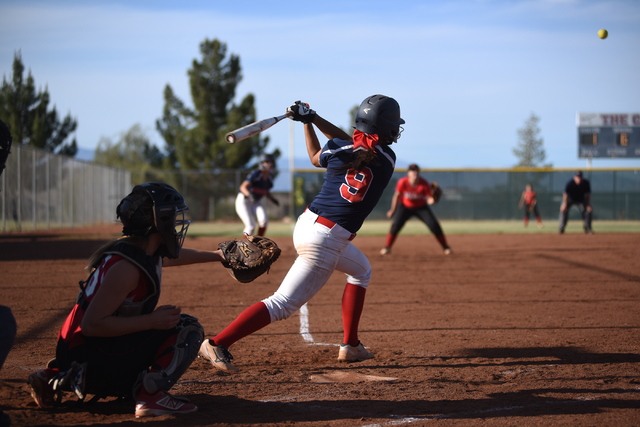 Coronado’s Basia Query (9) hits a pitch against Las Vegas High School during their sof ...