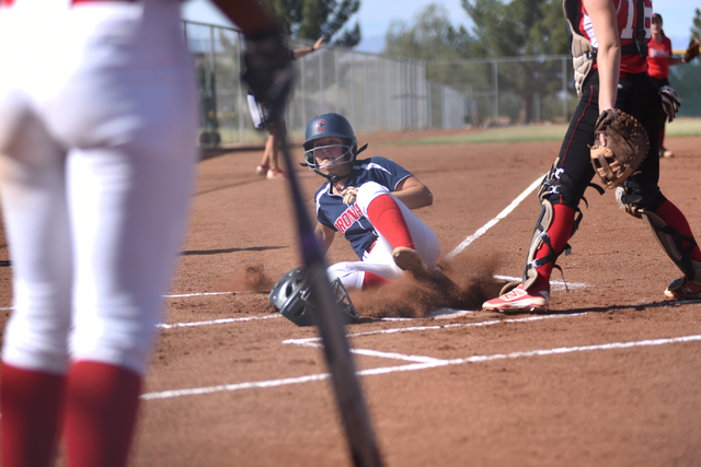 Coronado’s Dylan Underwood (4) slides in for a run against Las Vegas High School durin ...