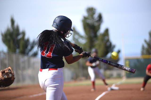 Coronado’s Jaiden Johnson (11) hits a pitch against Las Vegas High School during their ...