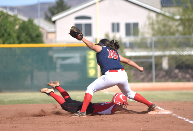 Coronado’s Jillian James (18) tags out Las Vegas High School’s Samantha Taylor ( ...