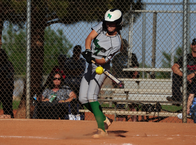 Palo Verde batter Camden Zahn hits a single in the third inning of their prep softball game ...