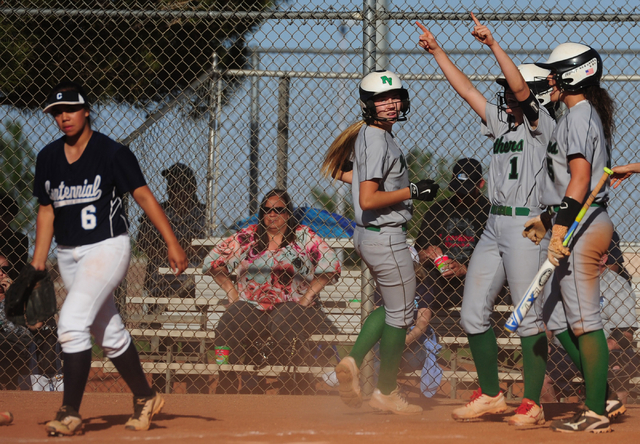 Palo Verde base runner McKenzie Ryan (1) celebrates after three runs were scored while Cente ...