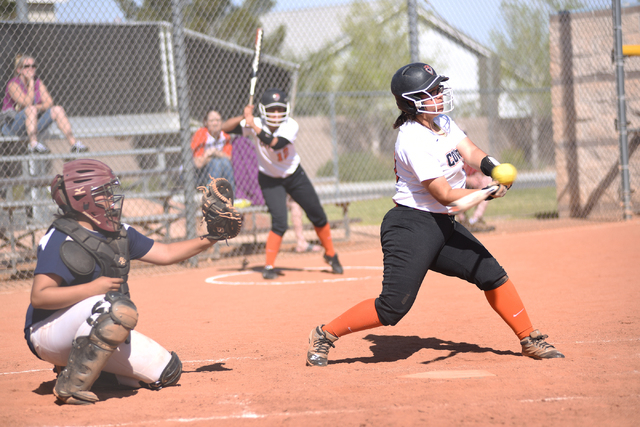 Chaparral’s Ellie Horton (10) swings at a pitch during Saturday’s game at Cheyen ...