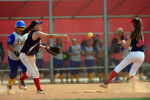 Liberty second baseman Adara Leyba lobs the ball to shortstop Cali Christopher (34) to compl ...