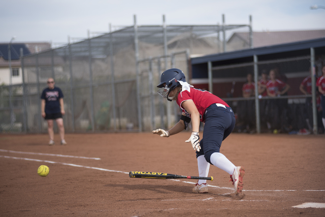 Coronado’s Dylan Underwood (4) bunts the ball against Spring Valley during their softb ...