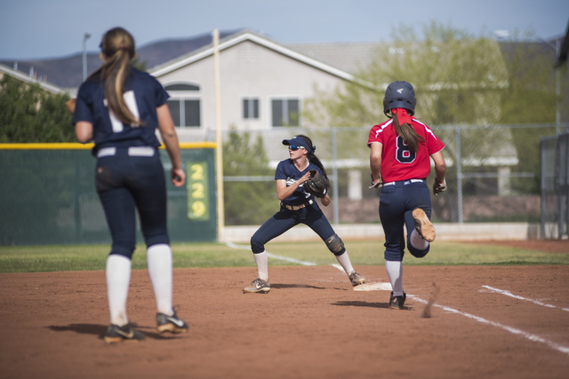 Spring Valley’s Mariah Ward (5) catches a ball at first for an out against Coronado&#8 ...