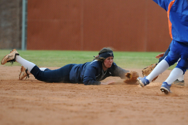 Legacy shortstop Lindsey Fishman makes a diving stop during Wednesday’s game against B ...