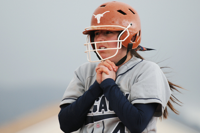 Legacy’s Lindsey Fishman (4) holds her hands together as rain and winds began to pick ...