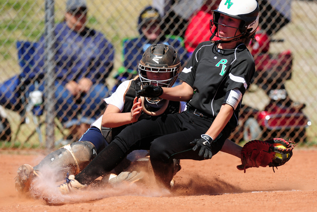 Centennial catcher Makenzie Ball tags out Palo Verde base runner Camden Zahn at home plate i ...