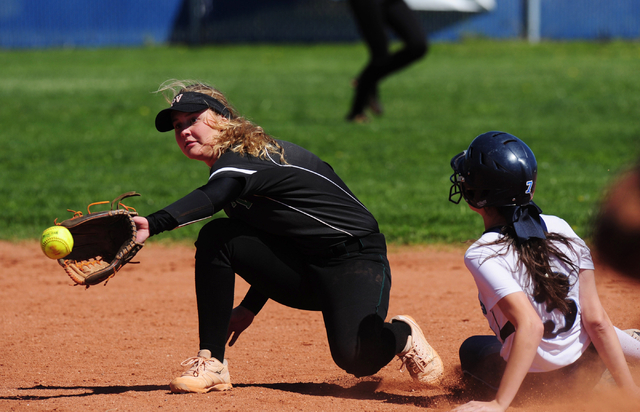 Centennial base runner Jasmine Rivera advances to second base on a ground ball while Palo Ve ...