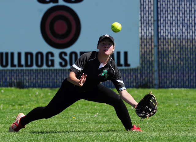 Palo Verde outfielder Makall Whetten is unable to catch a wind driven Centennial fly ball al ...