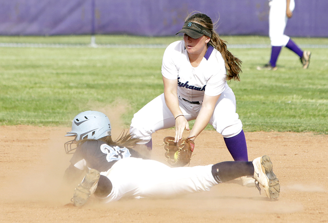 Foothill’s Katelyn Enzweiler slides head first at second as Silverado’s Alexa Os ...