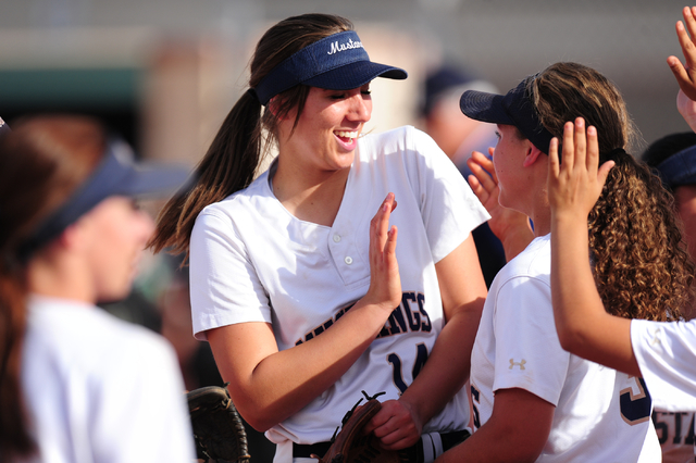 Shadow Ridge starting pitcher Shelbi Denman, center, and teammates celebrate their 4-3 win o ...