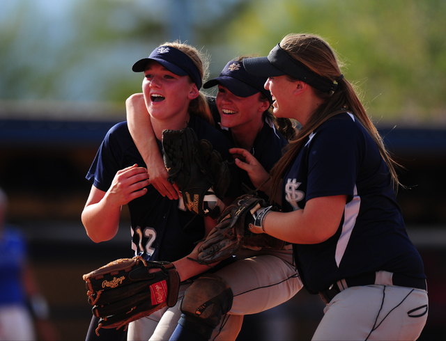 Spring Valley’s Mariah Ward, middle, and Stephanie Huff, right, congratulate starting ...