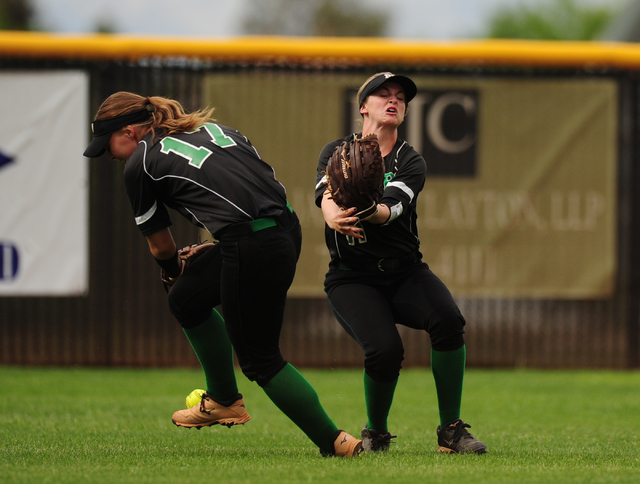 Palo Verde center fielder Brianna Jaffe (11) and second baseman Kali Tomlinson (17) are unab ...