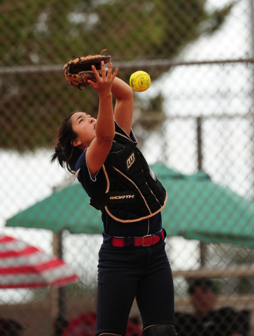 Coronado catcher Taylor Okamura is unable to catch a Palo Verde pop fly in the fourth inning ...