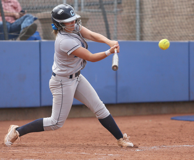 Centennial’s Lacie Chakos hits the ball during a softball game at Bishop Gorman on Fri ...