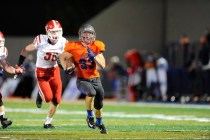 Bishop Gorman’s Jonathan Shumaker runs for a touchdown against Brophy Prep in the firs ...