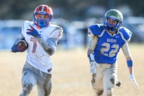 Bishop Gorman’s Biaggio Ali Walsh (7) rushes for a touchdown against Reed defender Log ...