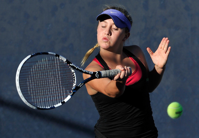 Palo Verde’s Sophie Henderson returns for the ball against Palo Verde’s Isabella ...