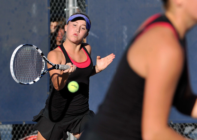 Palo Verde’s Sophie Henderson returns for the ball against Palo Verde’s Isabella ...