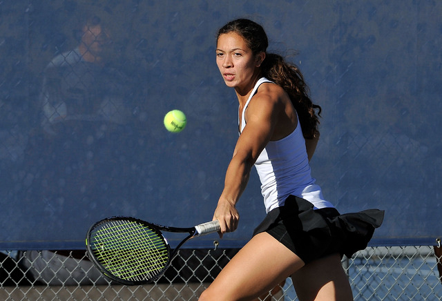 Palo Verde’s Tia Okano returns the ball against Palo Verde’s Chloe Henderson and ...