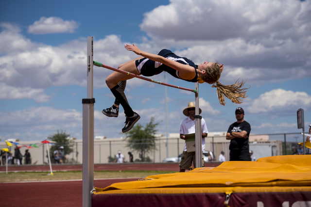 Delaney Gosse, The Meadows, clears 5-foot-8-inches in the high jump during the Nevada state ...