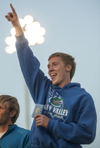 Green Valley High School’s Ian Mack celebrates his first place finish in the D1 400-me ...