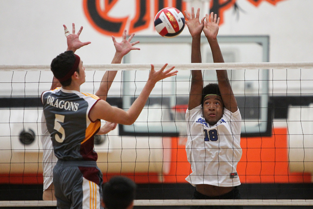 Del Sol’s Jared Moreda (5) hits the ball over Sierra Vista’s Christian McCoy (18 ...