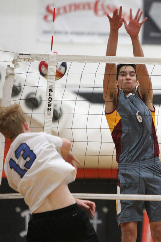 Del Sol’s La’aKea Cabanas (6) goes up for a block against Sierra Vista’s N ...