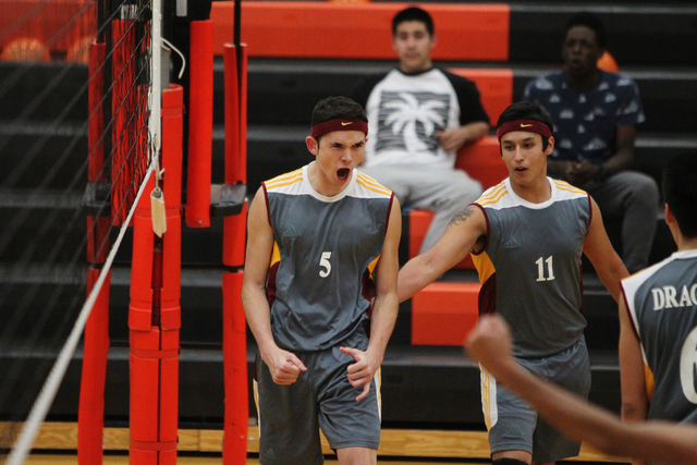 Del Sol’s Jared Moreda (5) reacts to a play with Nick Yala (11) in their men’s v ...