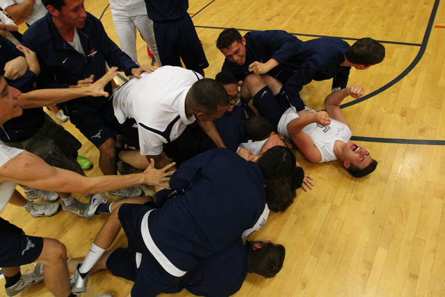 Legacy players and staff celebrate after defeating Las Vegas 3-0 in the Division I state vol ...