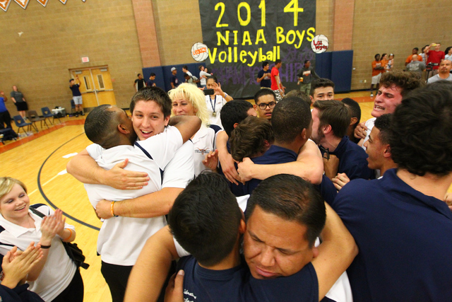 Legacy players and staff celebrate after defeating Las Vegas 3-0 in the Division I state vol ...