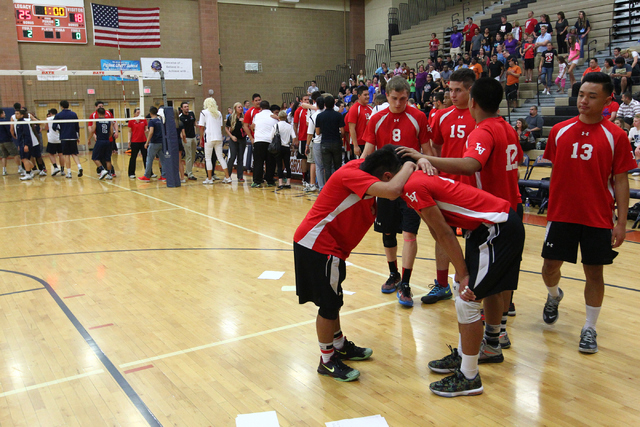 Las Vegas’ Shayne Marquez, center, with T.J. Esporas, react with teammates after losin ...