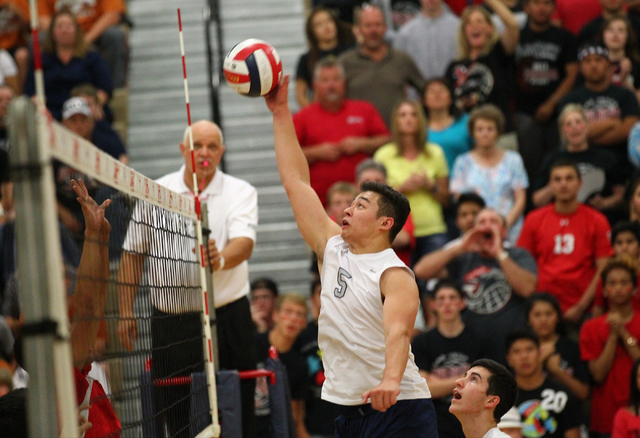 Legacy’s Braden Liu (5) spikes the ball against Las Vegas during the Division I state ...