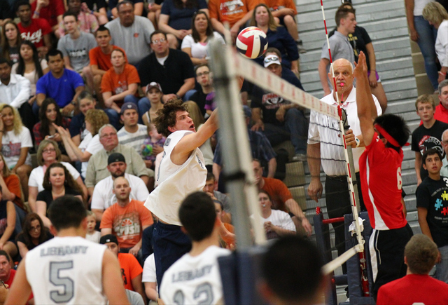 Legacy’s Trent Compton (8) sends the ball over the net against Las Vegas during the Di ...