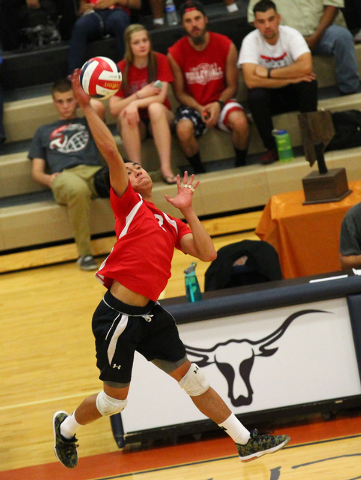 Las Vegas’ T.J. Esporas looks to send the ball over the net against Legacy during the ...