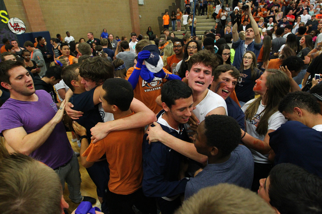 Legacy Trent Compton, center left, in white, and Tanner Compton, center right, celebrate wit ...