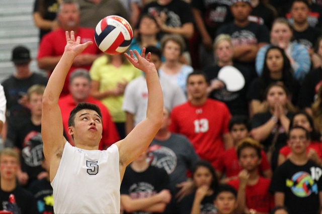 Legacy’s Braden Liu (5) sets the ball for a teammate during the Division I state champ ...