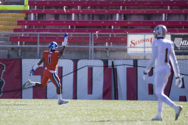 Bishop Gorman’s Greg Francis (1) celebrates a touchdown by Austin Arnold (6) against L ...